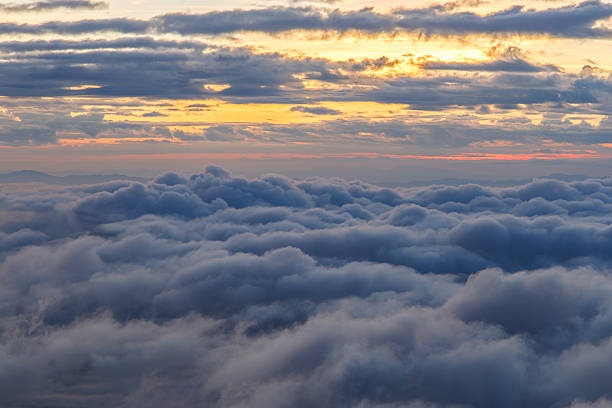 istock Layer of mountains and mist at sunset time 613329588