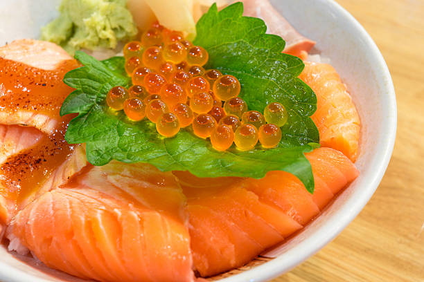istock Mixed rice bowl with fresh salmon 613329940