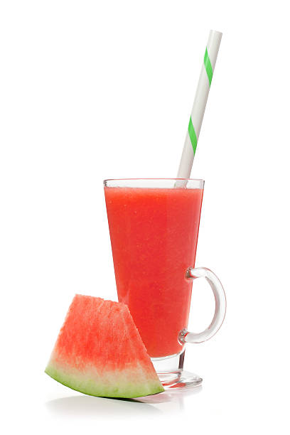 istock Watermelon smoothie in glass with handle and slice Watermelon 613331684