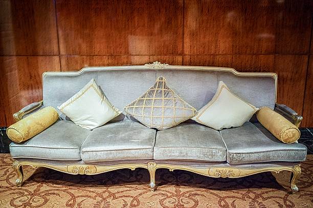 istock sofa with three gray pillow in a luxury living room 613332206