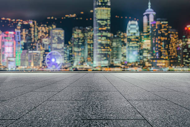 istock empty pavement front of  Hong Kong victoria harbour 613335834