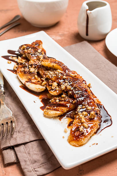istock Grilled banana with chocolate sauce 613339796