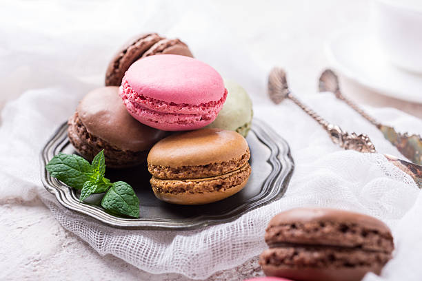 istock Cake macaron or macaroon, colorful almond cookies 613340160