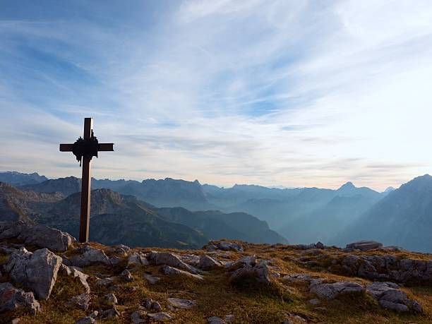 istock Alps mountains. View to long deep valley,  morning fog 613342394