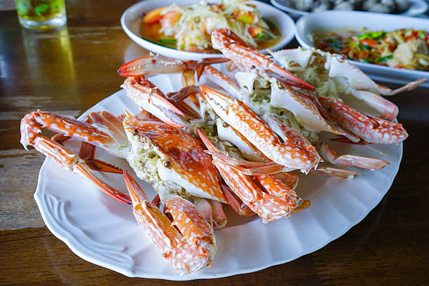 istock Steamed Crab Seafood Large crab cooked in red, orange 613343956