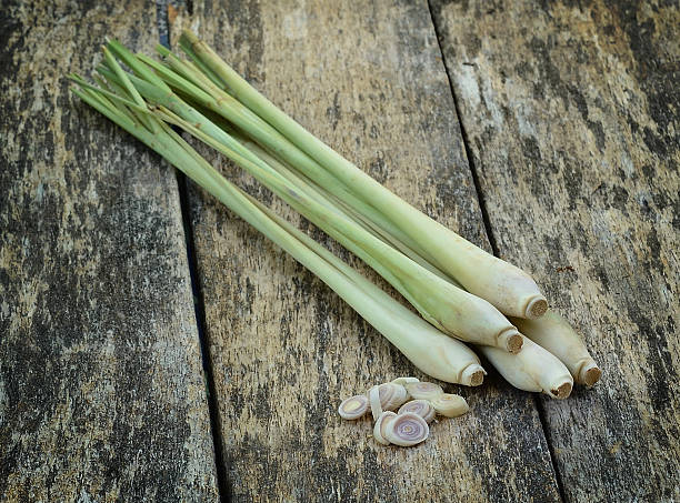 istock lemongrass on wood background. 613348010
