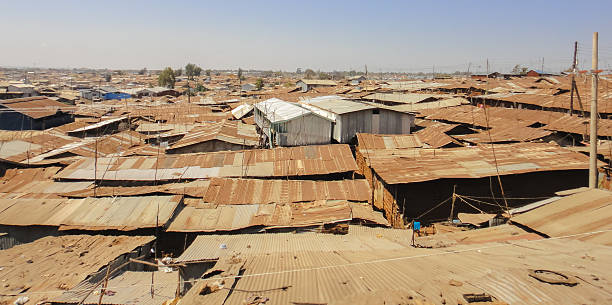 istock Kibera slum poor huts (or houses) near Nairobi. Kenya 613517328