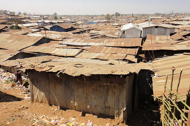 istock Kibera slum poor huts (or houses) near Nairobi. Kenya 613517608