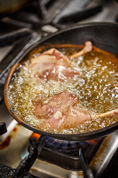 Duck legs frying
