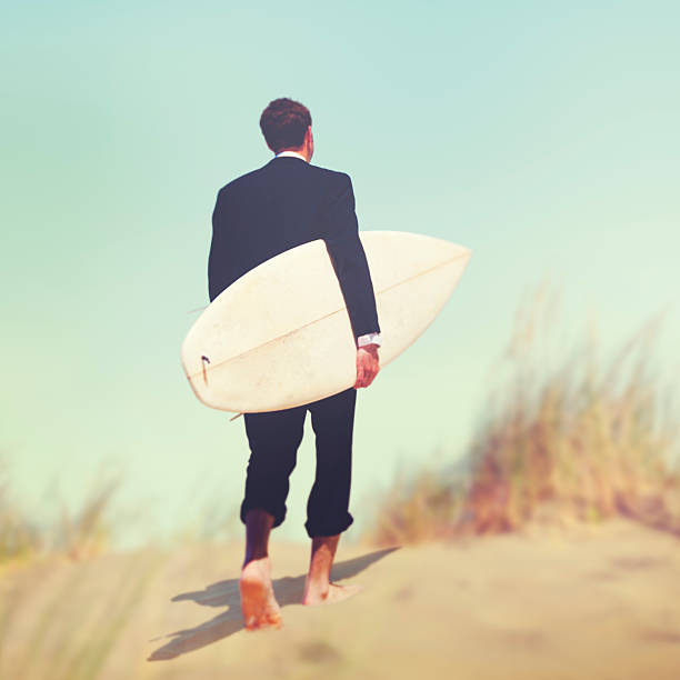 istock Businessman Surfboard Beach Summer Tropical Vacation Concept 613519510