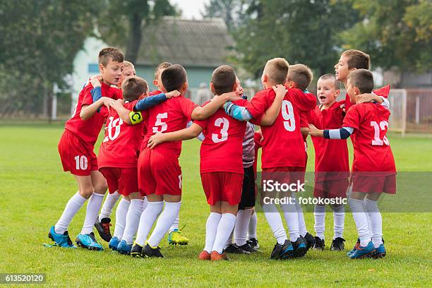 Kids Soccer Team In Huddle Stock Photo - Download Image Now - Child, Sports Team, Sport