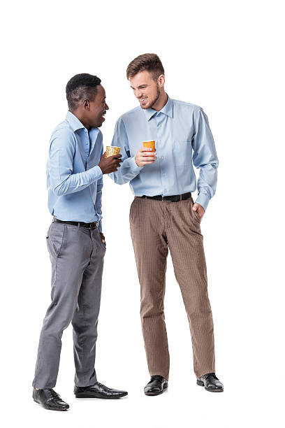 two businessman  drinking coffee - young male fotos imagens e fotografias de stock