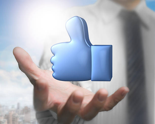 istock Man palm opening with 3D blue thumb up 613526022