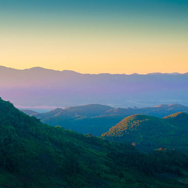 Panoramic view misty morning sunrise in mountain at north Thailand