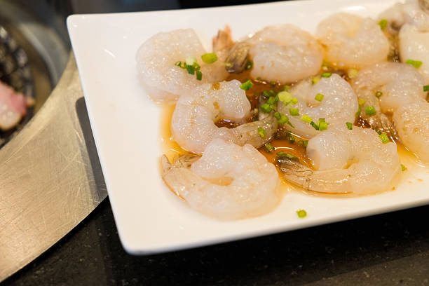 istock Raw shrimp with special sauce 613526460
