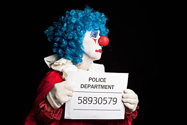 istock Sad Creepy Clown Profile Mugshot 613527364