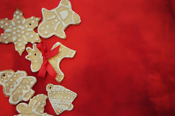 istock Gingerbread cookies on the red board, Chrismas background, 613527604