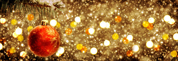 istock Christmas ball isolated on golden background. 613528992