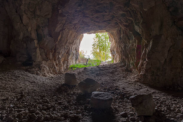 istock out of the cave. 613530446