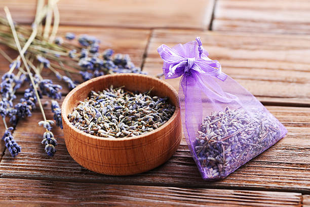 istock Lavender flowers in bowl on brown table 613531156