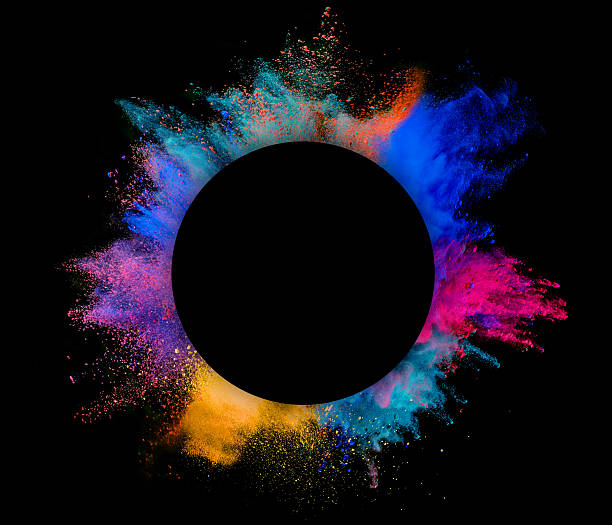 istock Explosion of colored powder on black background 613531890