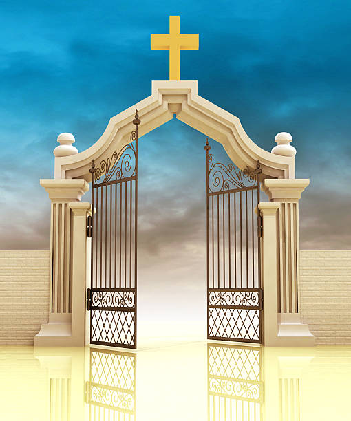 istock semi opened cemetery gate with golden cross 613531926