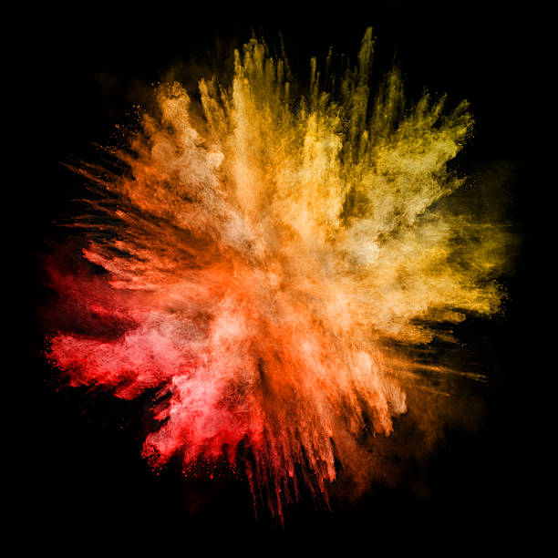 istock Explosion of colored powder on black background 613532132