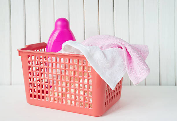 istock Terry towels and detergent in the laundry basket 613532202