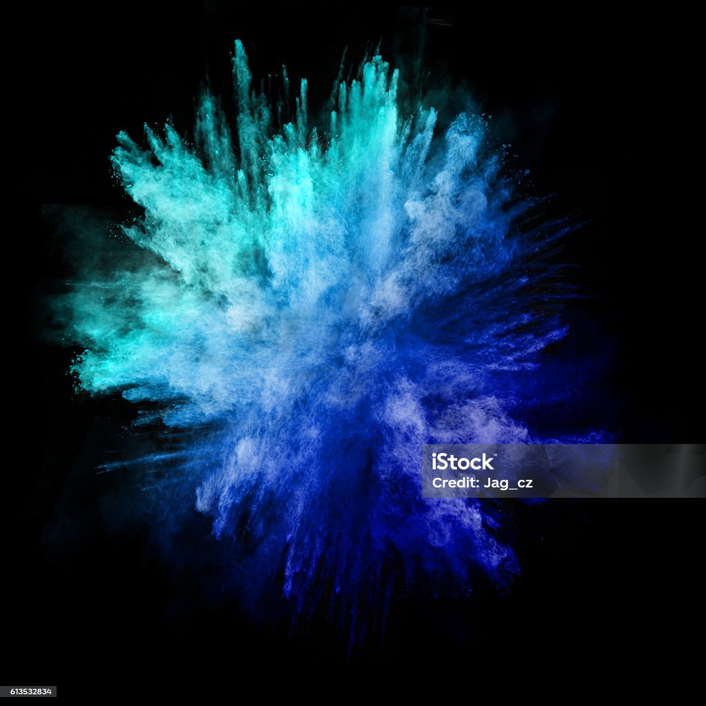 Explosion of colored powder on black background Explosion of colored powder, isolated on black background Exploding Stock Photo