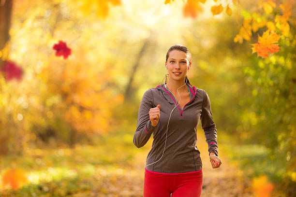 istock Athlete young woman running in morning 613532938