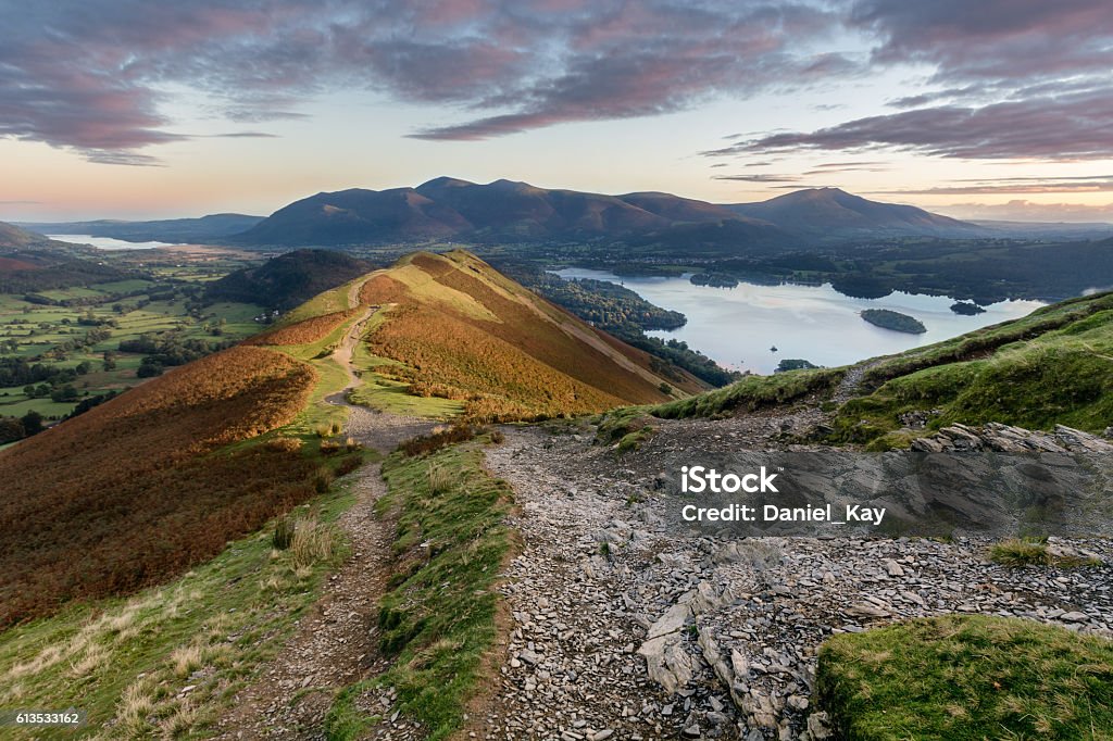 Vibrant sunrise at Catbells in the English Lake District. Autumn vibrant sunrise on Catbells in the English Lake District. Catbells Stock Photo
