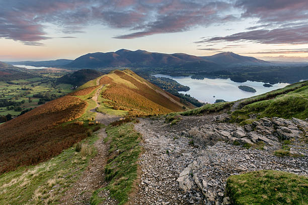 Vibrant sunrise at Catbells in the English Lake District. Autumn vibrant sunrise on Catbells in the English Lake District. cumbria photos stock pictures, royalty-free photos & images