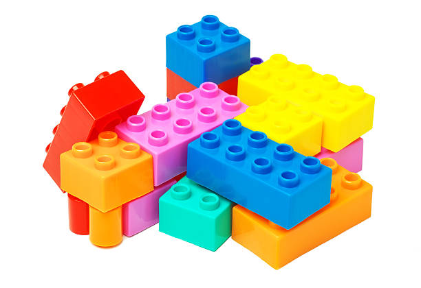 istock Toy colorful plastic blocks isolated on white background 613533592