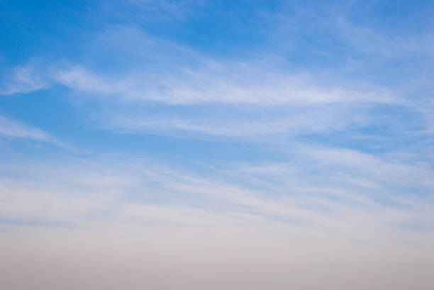 istock image of blue sky white clouds on day time 613536088