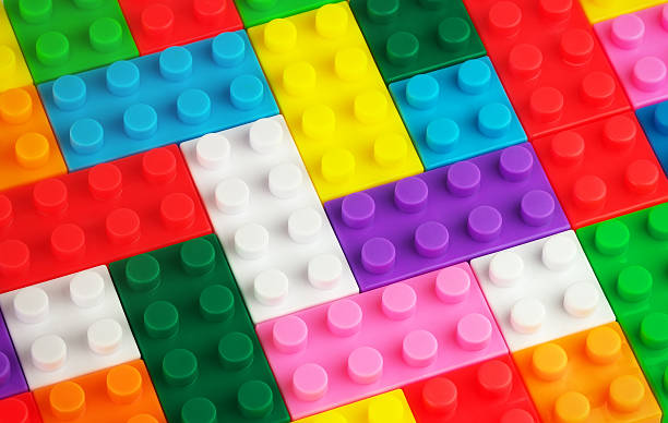 istock Toy background made of colored plastic bricks 613536786