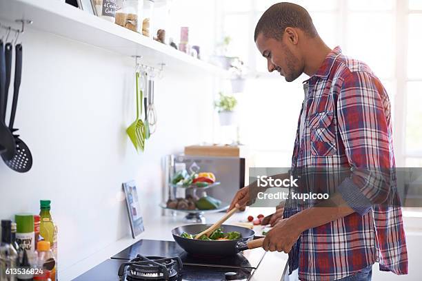 Cooking Up Something Good In The Kitchen Stock Photo - Download Image Now - Cooking, Men, Kitchen