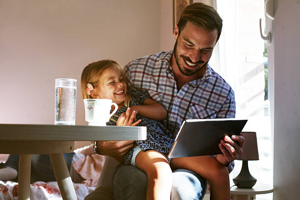 istock Little girl with her father. 613540414