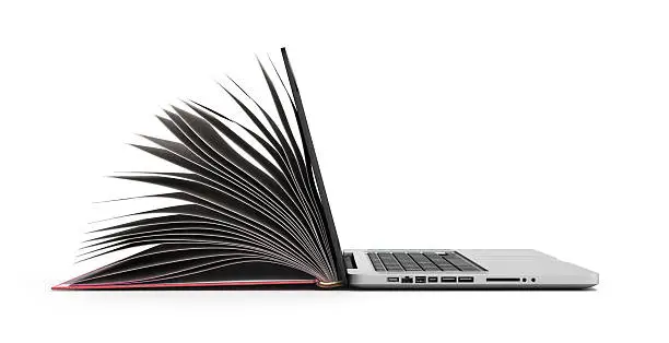 Photo of creative E-learning Concept Book and Laptop