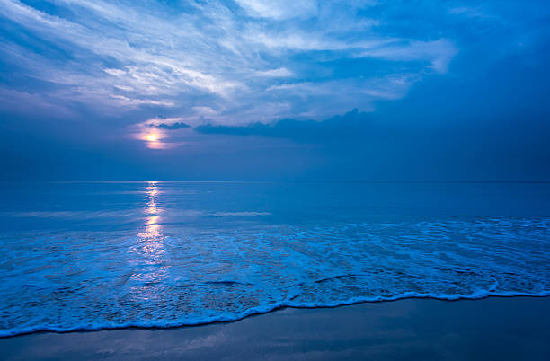 istock Beautiful secluded beach at night. 613541752