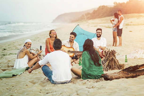 istock Sunset party at the beach 613542198