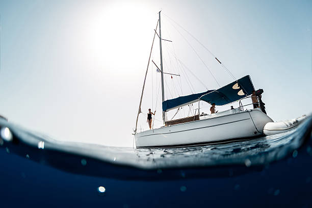 istock Young people on a yacht 613545926
