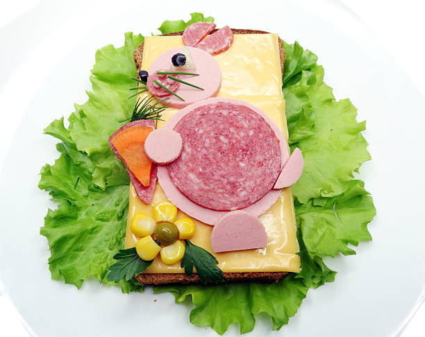 istock creative vegetable sandwich with cheese and sausage 613546034