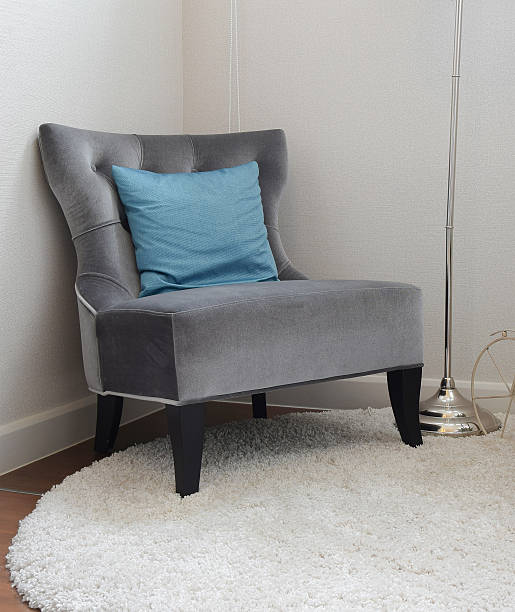 istock luxury grey tweed sofa with blue pillow in living room 613546446