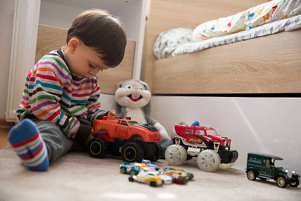 istock boy play toys 613547092