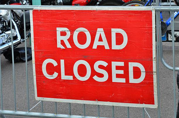 istock Large red road closed sign. 613547418