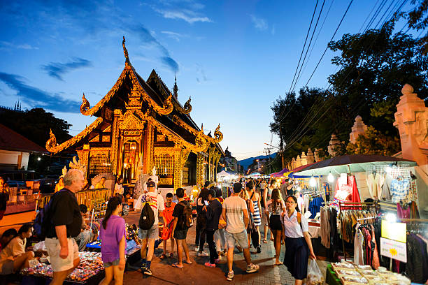 Sunday market walking street Chiang Mai, Thailand - October 9, 2016 : Sunday market walking street, The city center Thai temple marketing and trading of local tourists come to buy as souvenirs. this market is held every sunday and is very popular. chiang mai province stock pictures, royalty-free photos & images