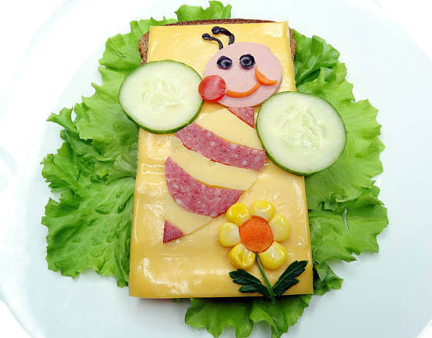 istock creative vegetable sandwich with cheese and sausage 613549632