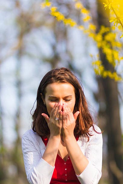 istock Woman sneezing 613549868