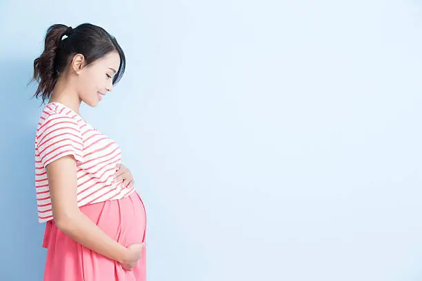 Photo of pregnant woman is smile