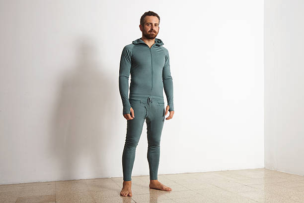 Man in thermal baselayer wear ninja suit set stock photo